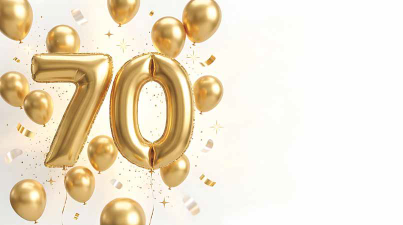 Goldene Folienballons, die die Zahl 70 bilden, umgeben von weiteren goldenen Luftballons und Konfetti auf hellem Hintergrund.